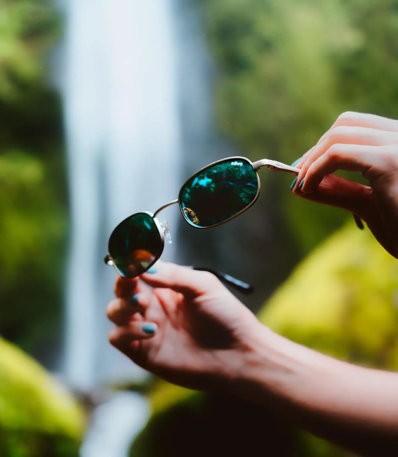 Revo Sunglasses Cobra: Polarized Crystal Glass Lens with Stainless Steel Round Frame