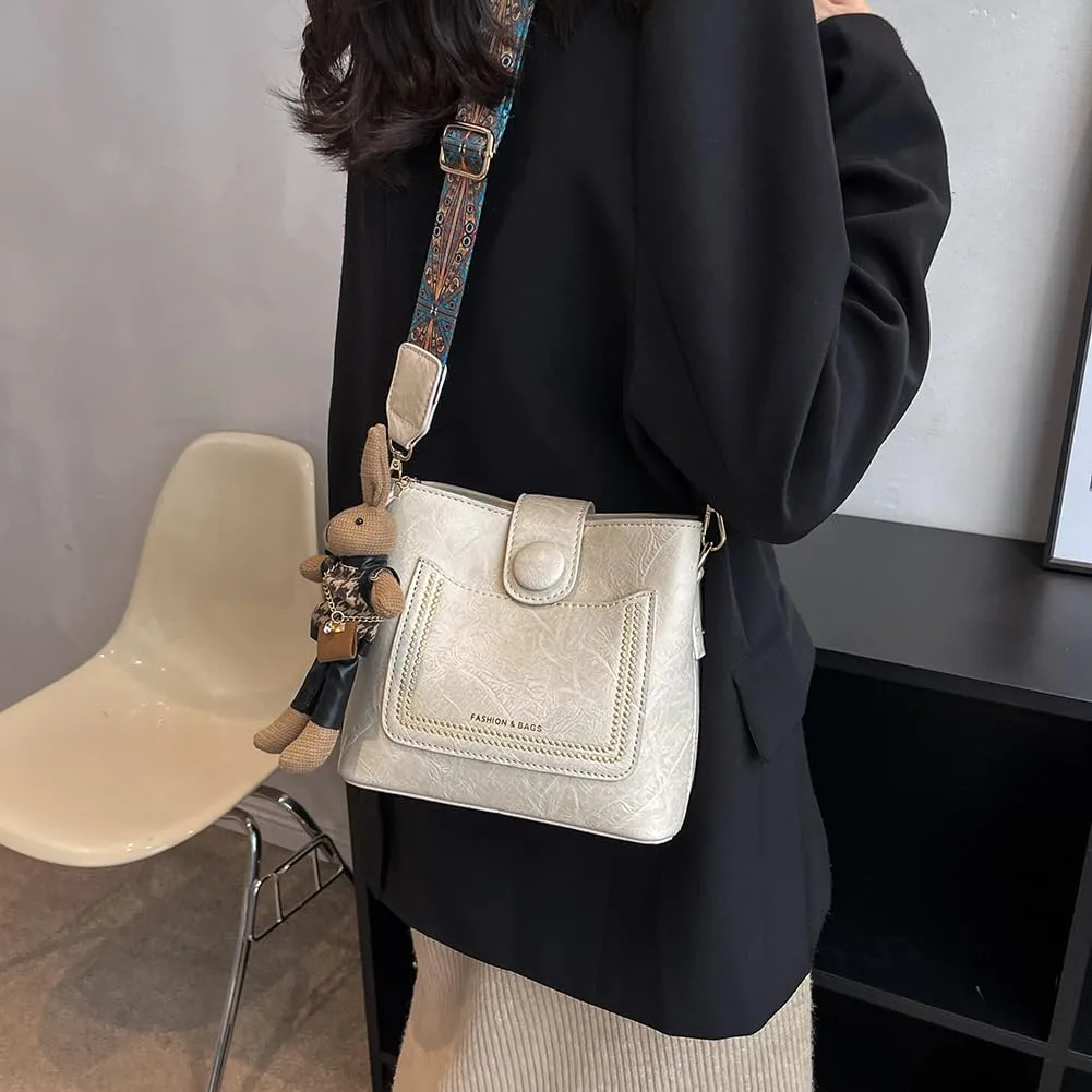 Womens Crossbody Bags Mini Faux Leather Shoulder Bag with Guitar Strap Small Bucket Hobo Bag Purses with Bunny Doll