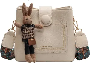 Womens Crossbody Bags Mini Faux Leather Shoulder Bag with Guitar Strap Small Bucket Hobo Bag Purses with Bunny Doll